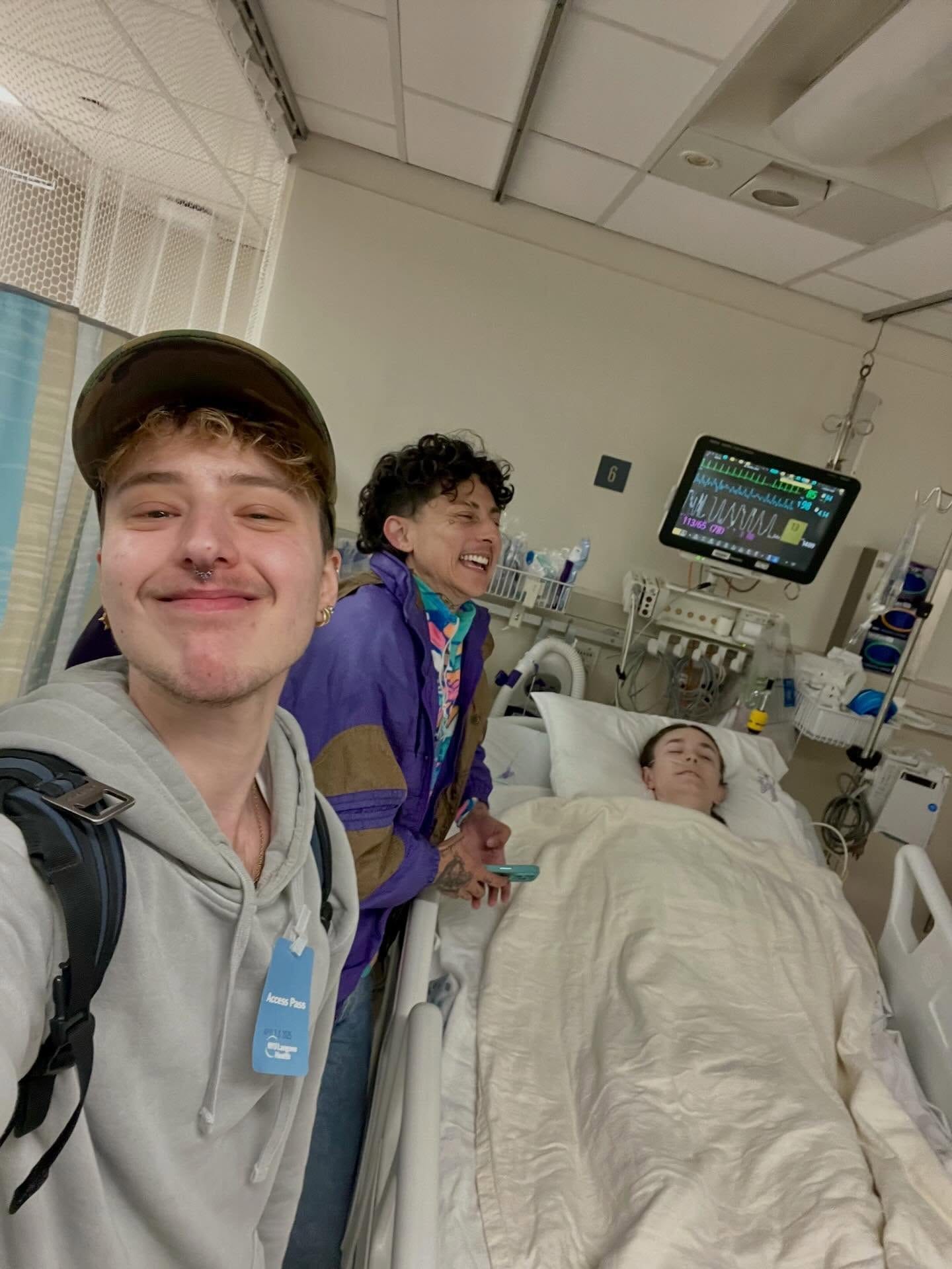 Friends visiting Grace in her hospital room.
