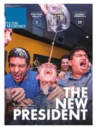 A celebratory student photograph with the words The New President.