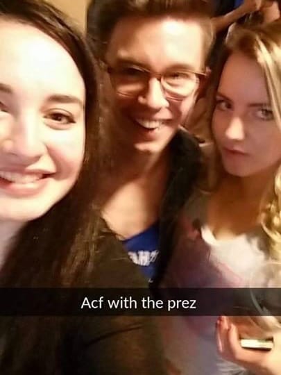An archival selfie with friends, captioned Afc with the prez.