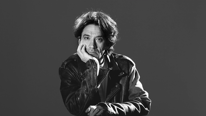 Black and white photo of Curtis Yarvin.